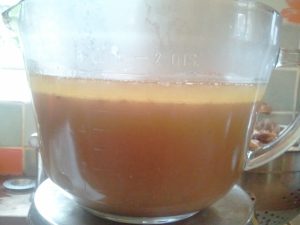 Fat and marrow separating in a jug