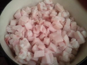 Put the chopped fat into a heavy based saucepan. Here I am using a cast iron pot.