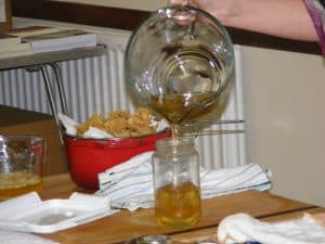 Using a jug with a pouring lip makes life so much easier and cleaner when it comes to decanting the lard into glass jars.